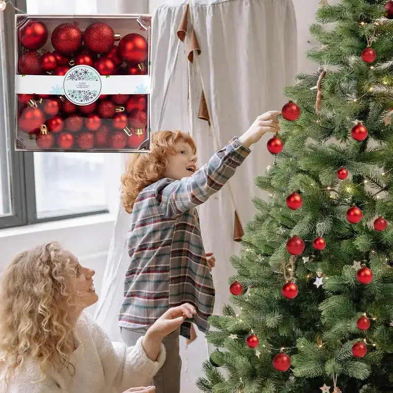 Family decorating Christmas tree with red ornaments and festive joy.