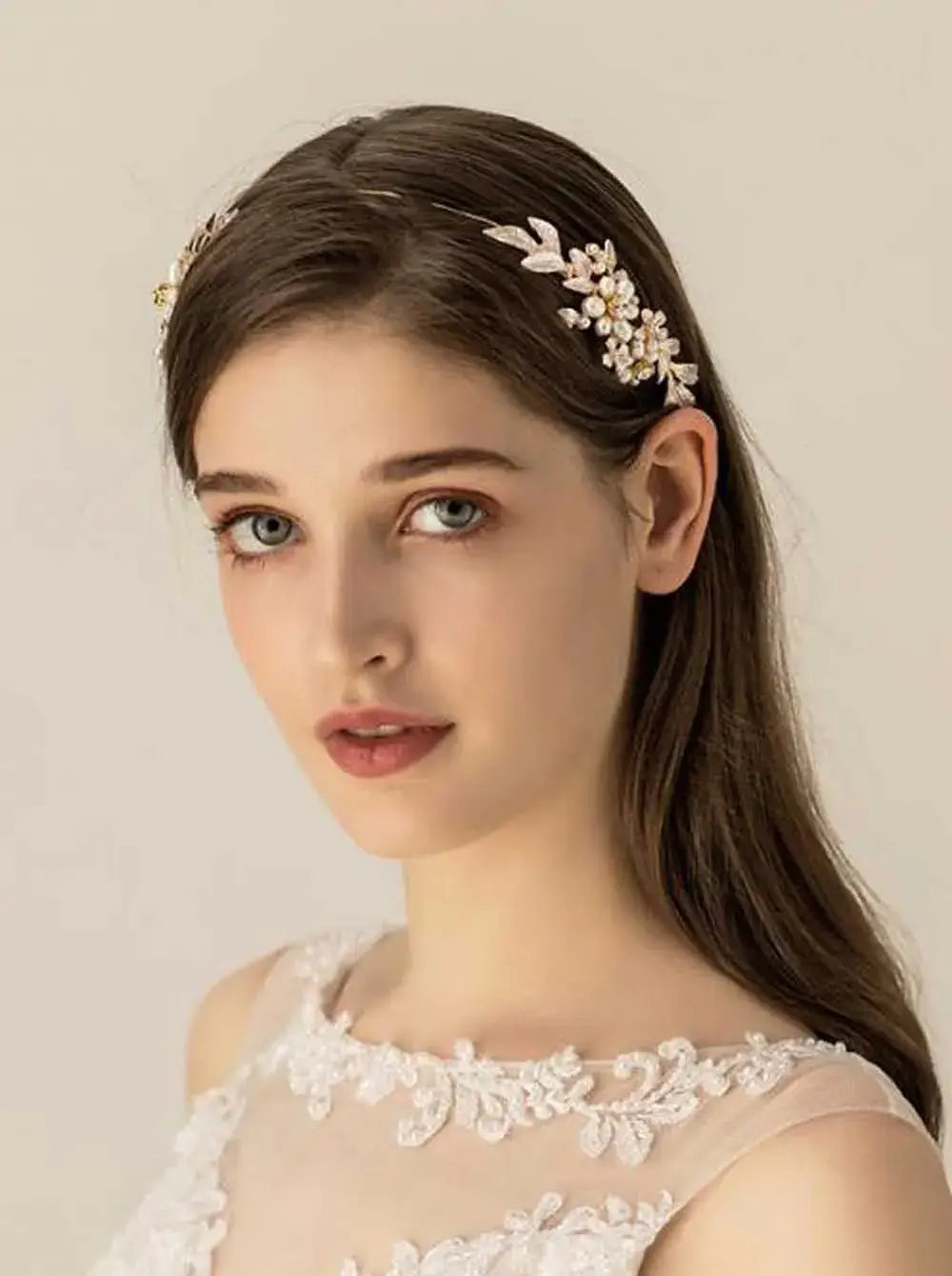 Princess Leaves Hair Accessories worn on side-parted hair, featuring delicate metallic leaves and pearl accents for formal events.