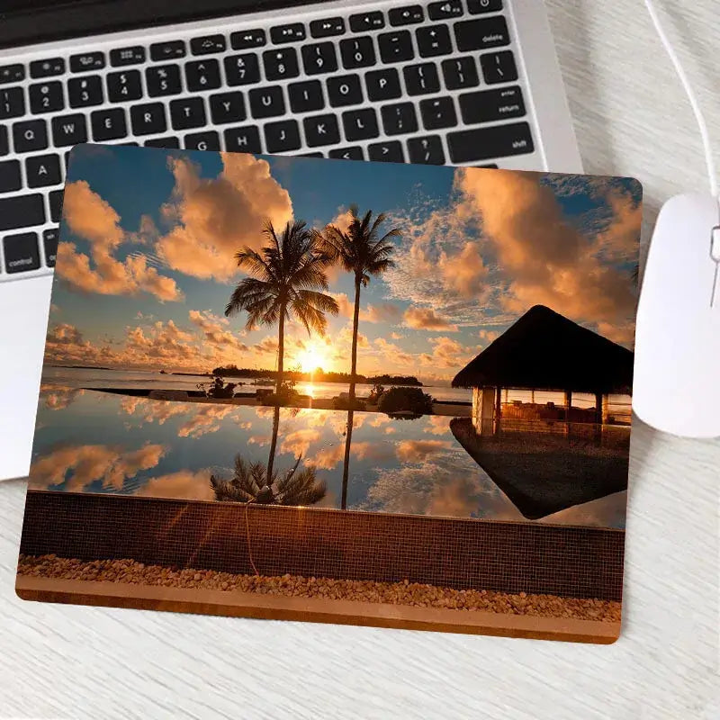Custom gaming mouse pad featuring tropical sunset with palm trees and ocean view. Combines style and precision for immersive gameplay.