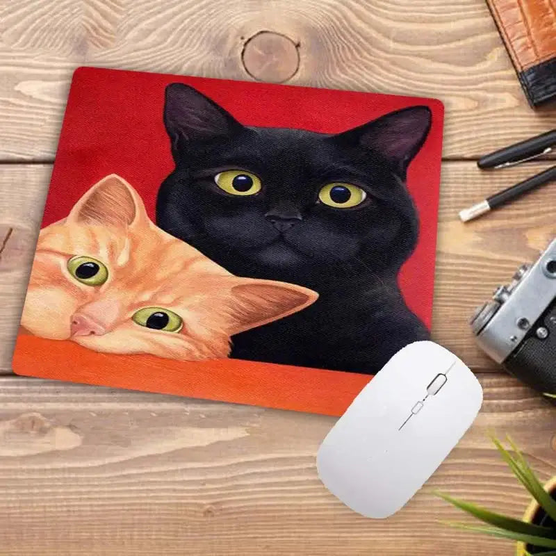 Cute Cat Mousepad with realistic illustration of black and orange cats. Bold and expressive design for stylish desk decor.