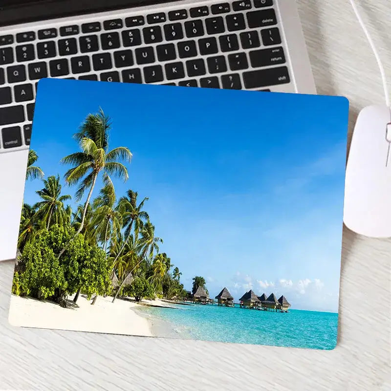 Custom gaming mouse pad with overwater bungalows and palm-lined beach. Smooth surface ensures accurate mouse tracking and style.