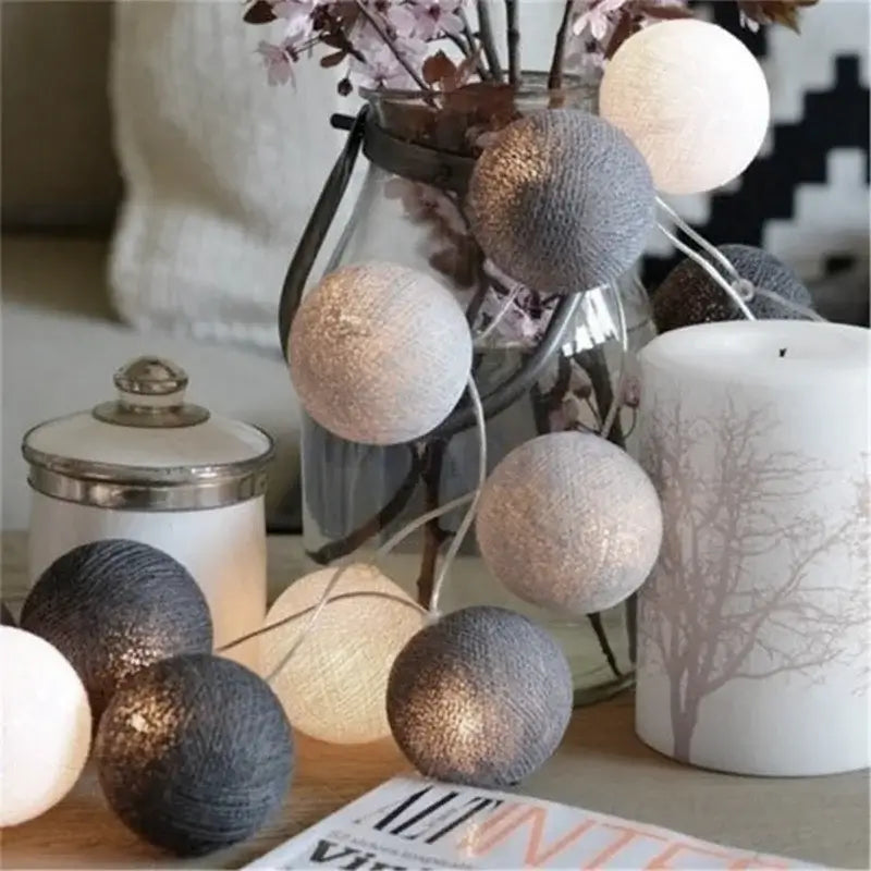 Monochrome LED String Lights Cotton Balls in grey and white tones, styled on a table for modern home decor.