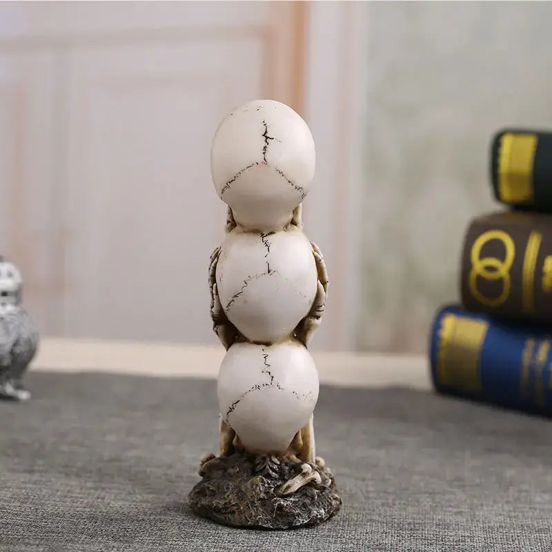 Back view of Creative Skull Statue Resin showing cracked skull textures. Unique resin sculpture for home and garden decor collections.