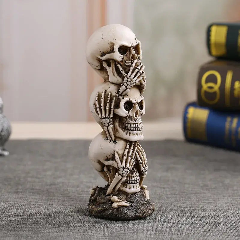 Side view of Creative Skull Statue Resin showing detailed bone texture and stacked skull design. Ideal for unique home and garden sculpture.