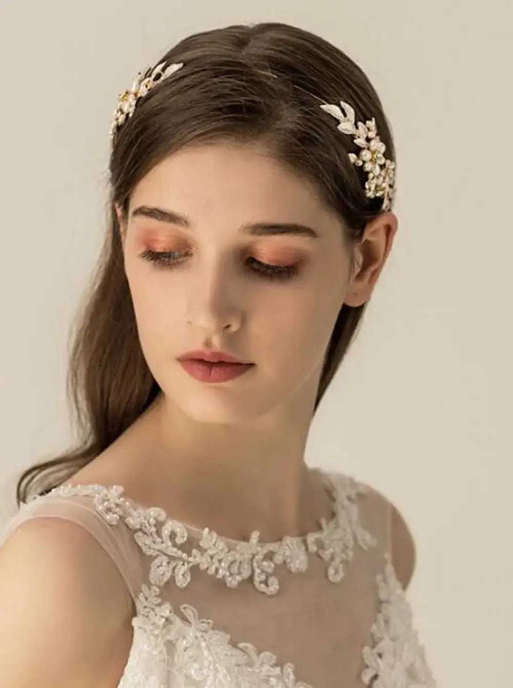 Close-up of Princess Leaves Hair Accessories on model with soft makeup, highlighting intricate floral and leaf detailing.