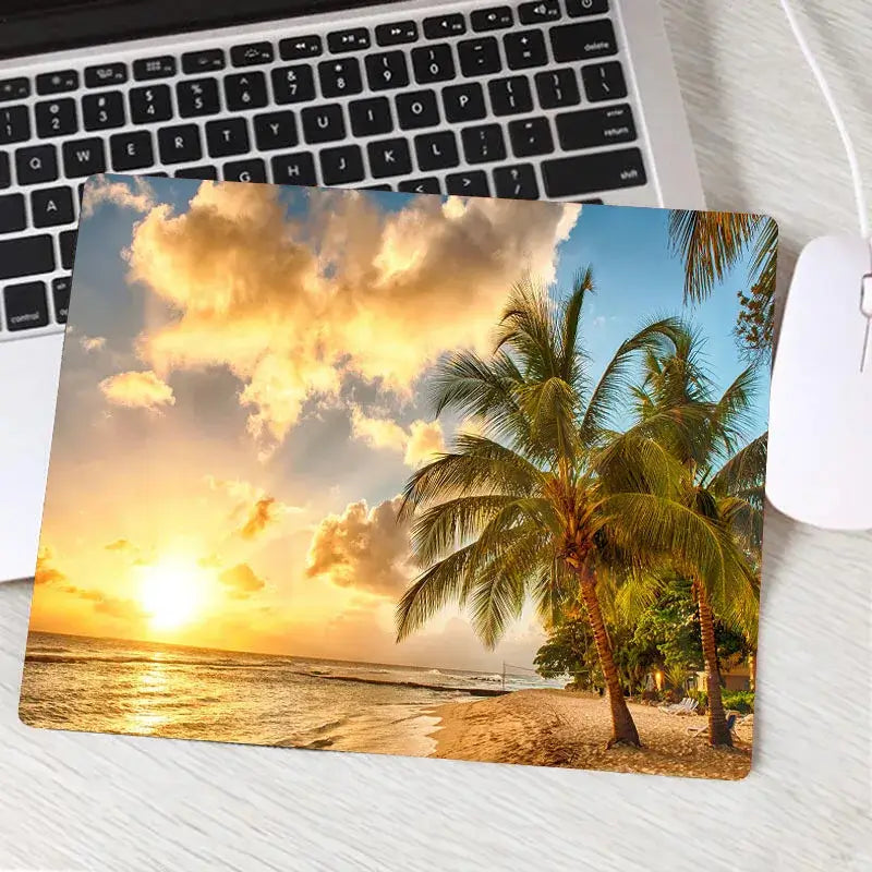 Gaming mouse pad featuring golden beach sunset with palm trees. Custom tropical design blends performance with visual relaxation.