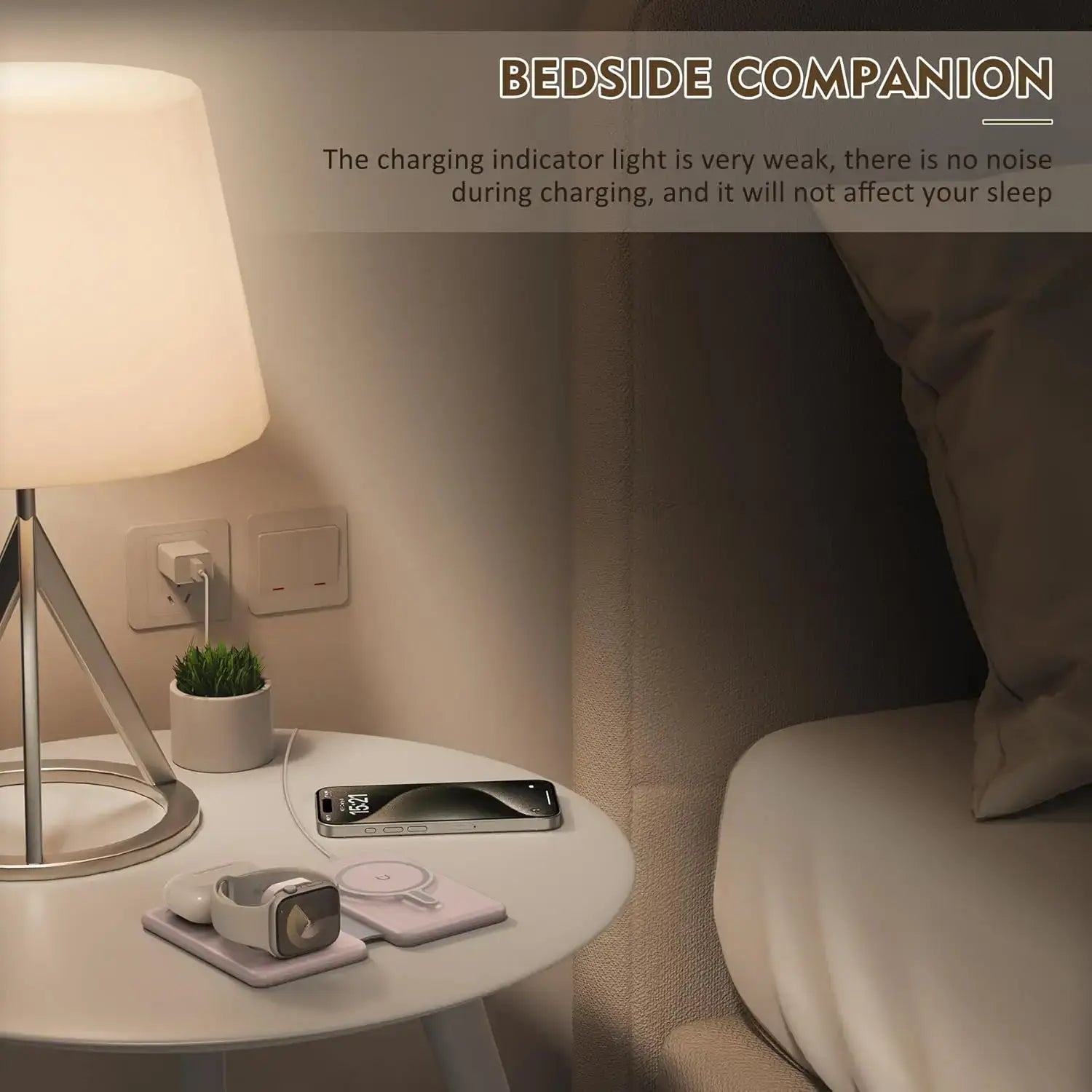 Pink 3-in-1 Apple MagSafe Wireless Charger on bedside table with dim indicator light, perfect for quiet overnight charging.