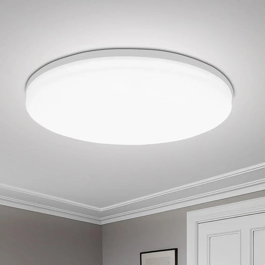 Round LED Ceiling Light with ultra-thin minimalist design mounted in a modern room. Ideal for bright, space-saving ceiling lighting.