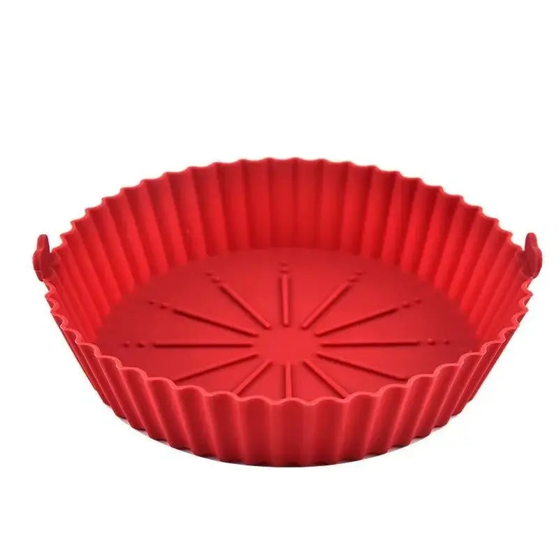 Red silicone air fryer liners pot with ridged sides and handles. Ideal for air frying, baking, and easy food removal.