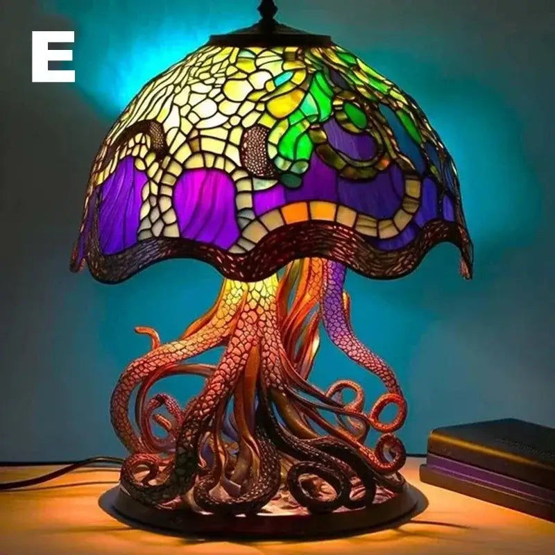 Octopus-inspired stained glass table lamp with tentacle base and colorful dome. Unique piece from the Stained Plant Series.