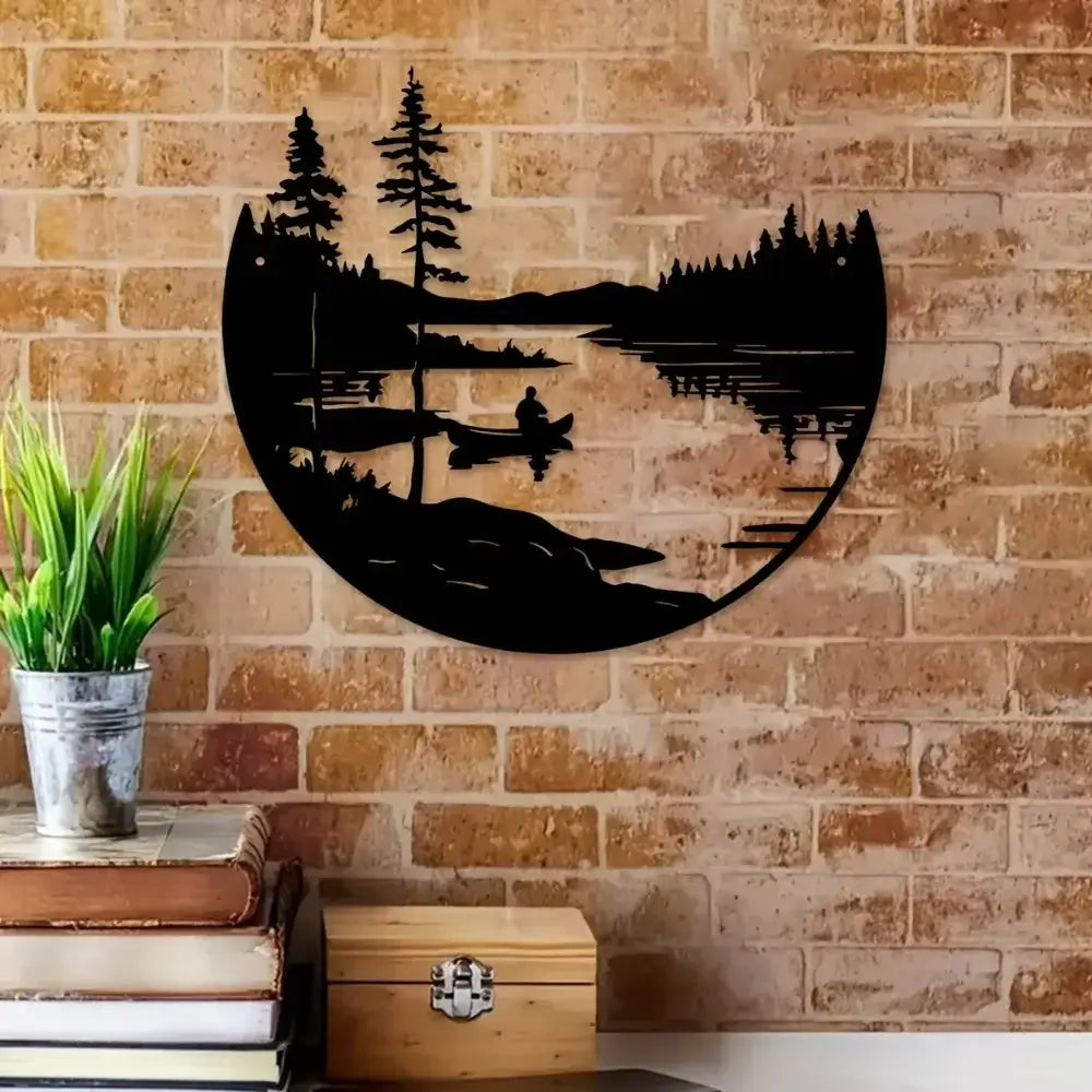 Bohemian metal wall decor of a lake and mountain silhouette mounted on a brick wall, ideal for rustic or industrial interiors.