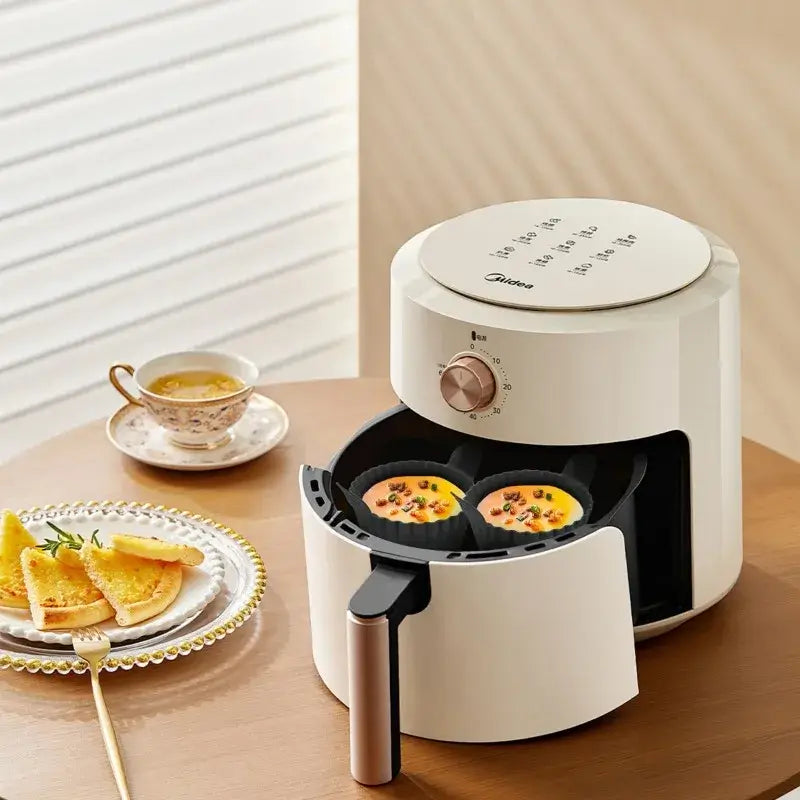 Air Fryer Silicone Egg Cups in white air fryer with cooked egg bites. Great for breakfast prep with non-stick and reusable silicone.