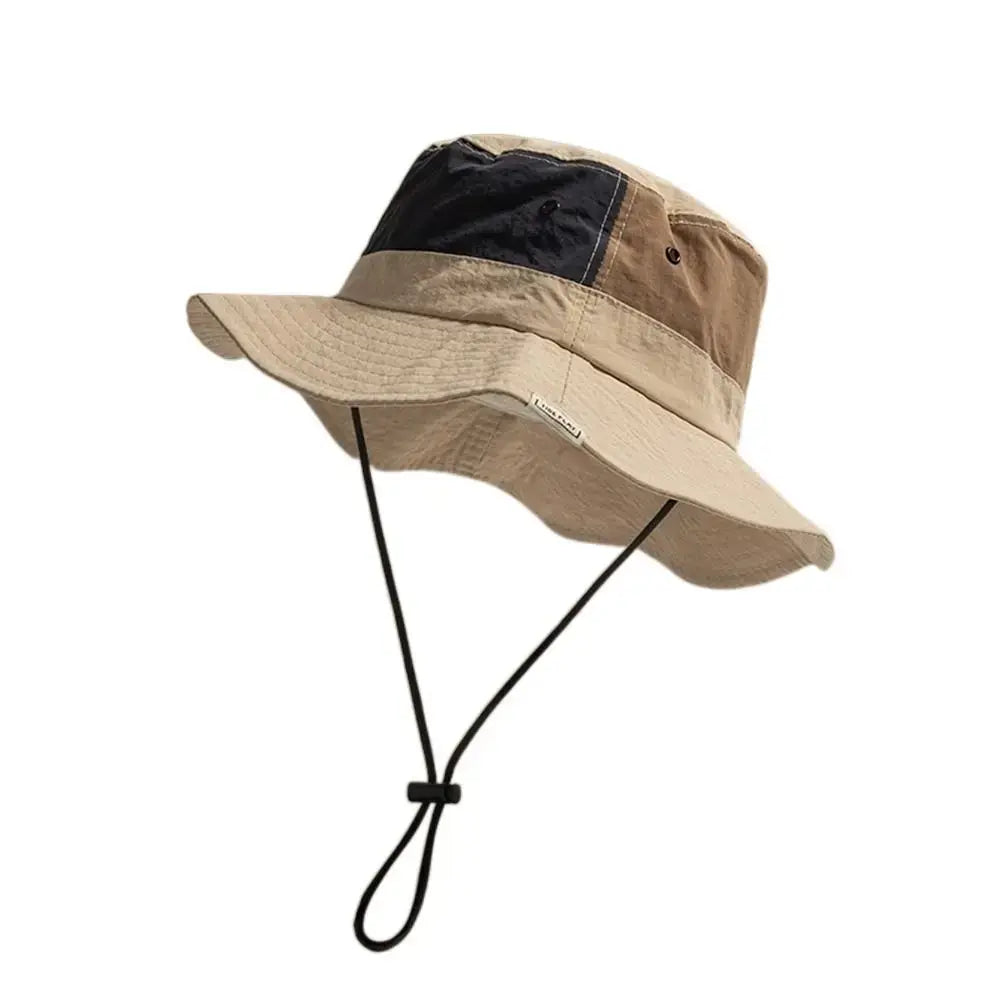 Beige Sun Protection Bucket Hat - Quick-dry with navy panel and chin strap. Lightweight and adjustable for outdoor sun protection.