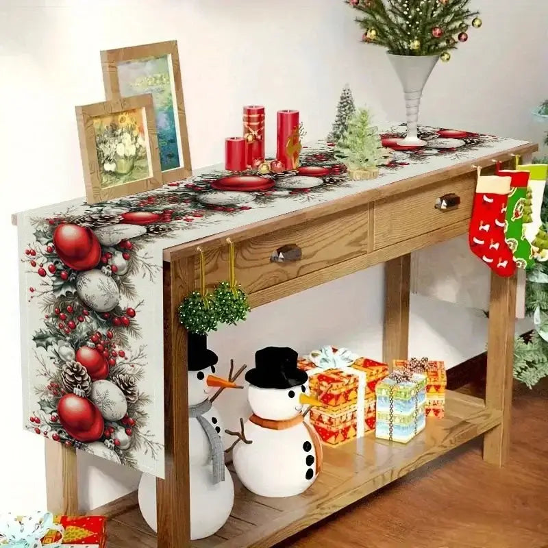 Festive Christmas Linen Table Runner with pinecones and red berries displayed on a console table with snowman decor and gifts.