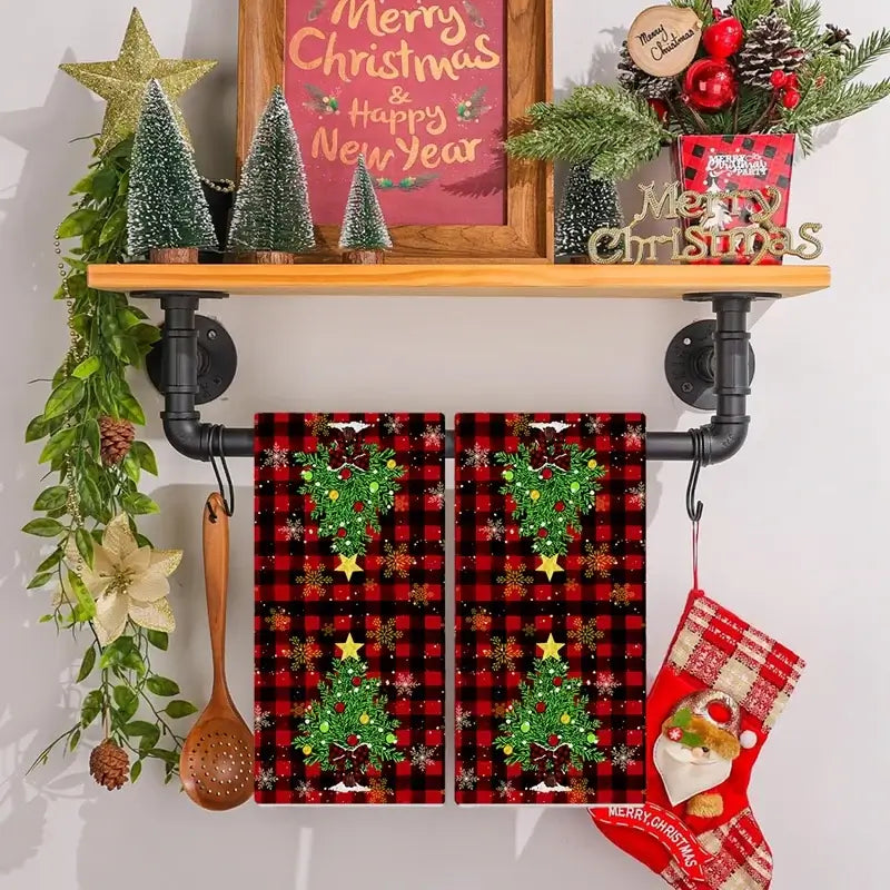 Two-piece dish towel set with plaid trees and 'JOY' ornament design. Cotton towels sized 40x48cm for Christmas kitchen decor.