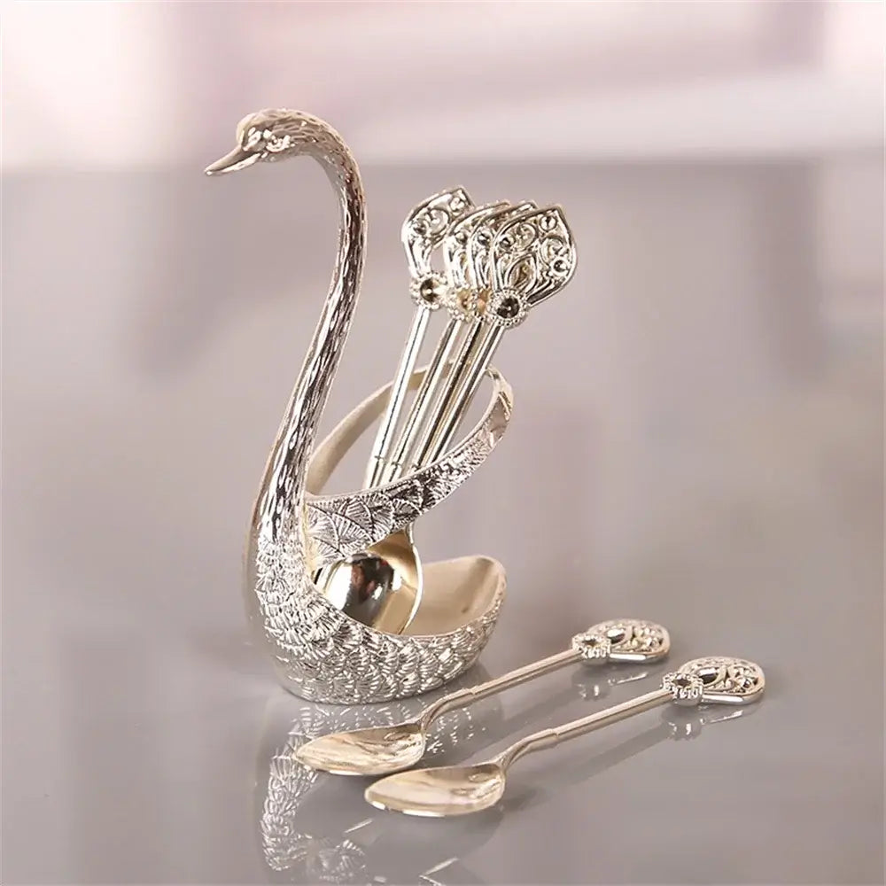 Silver Swan Spoon Holder Set with 6 decorative spoons, ideal for upscale table settings and refined kitchen aesthetics.