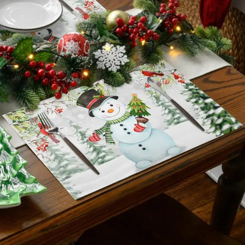 Festive linen placemat with snowman in top hat and scarf, perfect for Christmas dining. Durable, quick-drying, and fade-resistant.