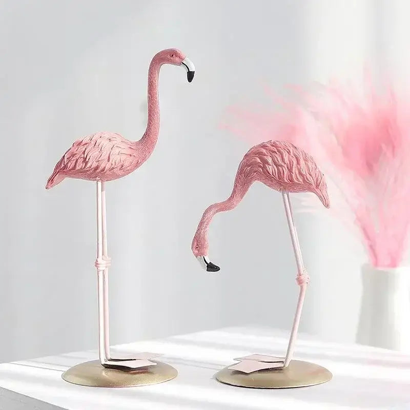 Two Creative Resin Flamingo Figurines in standing and feeding poses, adding charm to modern home or garden spaces.