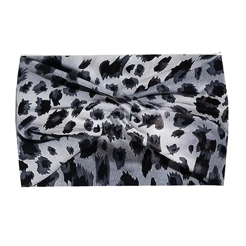 Gray leopard print 18CM stretch headband with twisted knot design. Perfect for athletic or casual outfits.