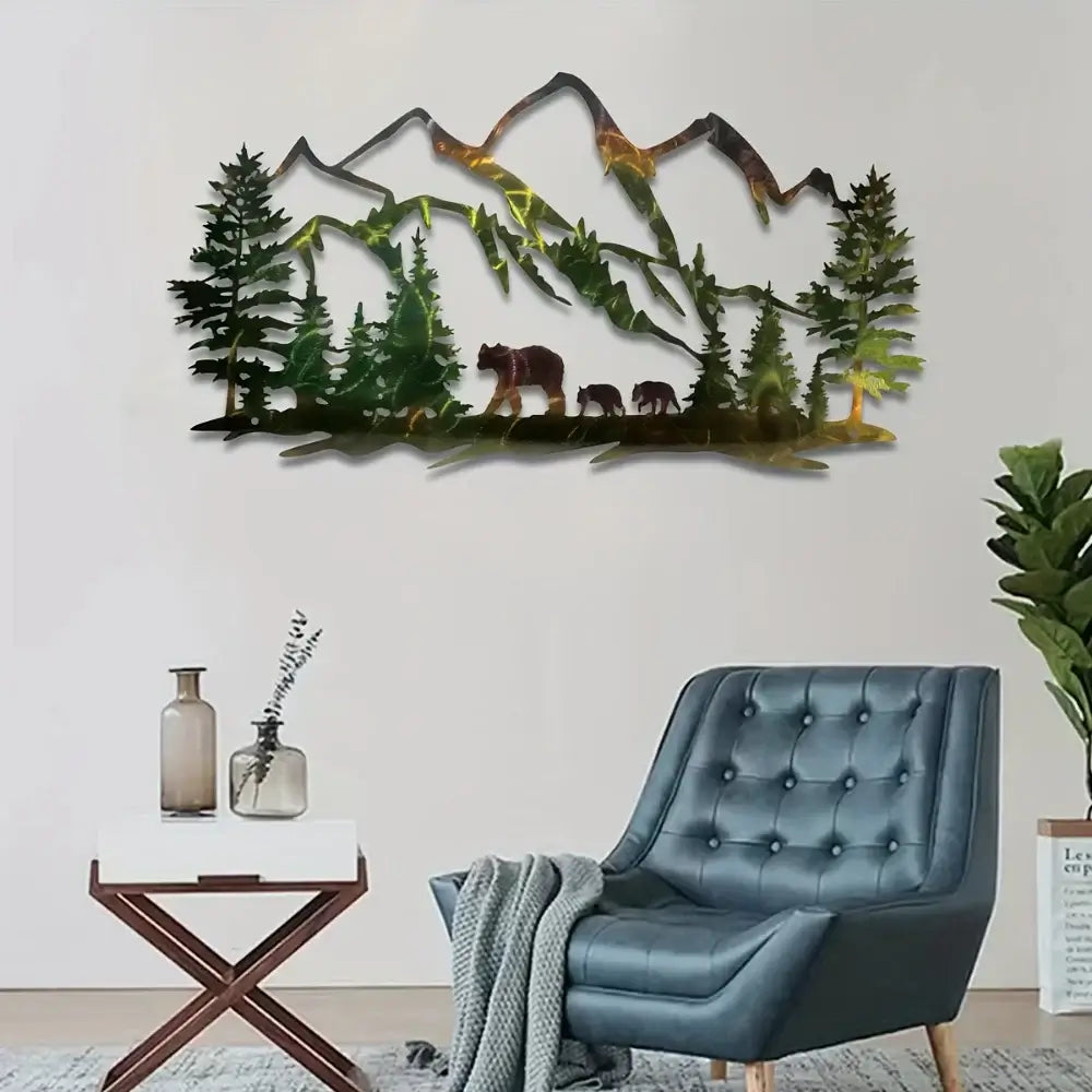 Metal Forest Mountain Bear Art hanging above a blue accent chair. Rustic wall decor perfect for nature lovers and cozy interiors.