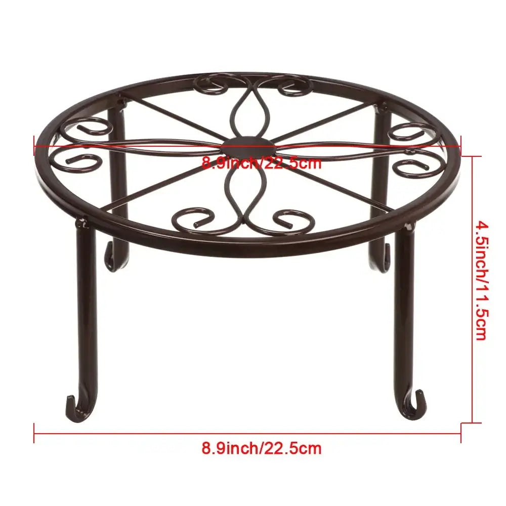 Brown metal plant stand with scroll design and dimensions labeled, showcasing its sturdy and compact build for large pots and planters.