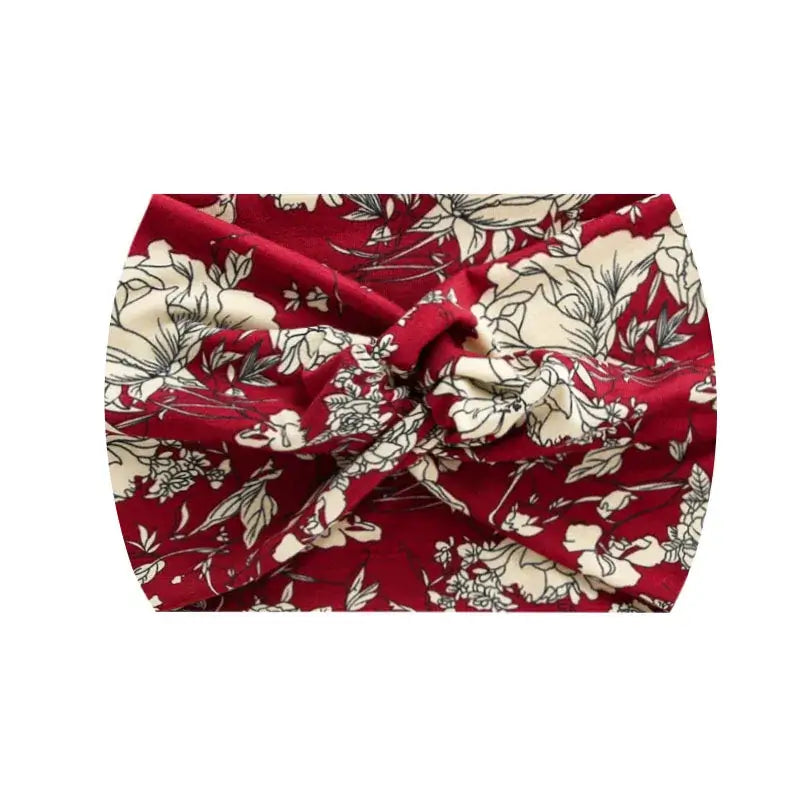 Red floral 18CM stretch printed headband made of soft polyester-spandex. Stylish and functional for sports or casual wear.