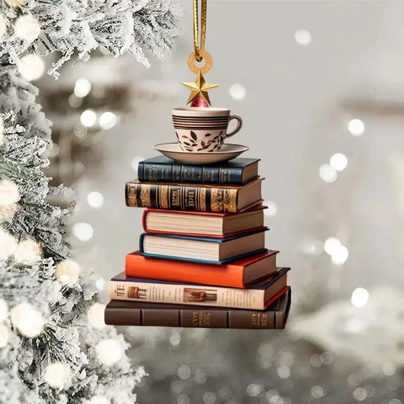 Holiday ornament shaped like a book stack with a teacup topper, a unique Christmas tree bookshelf pendant for literary fans.