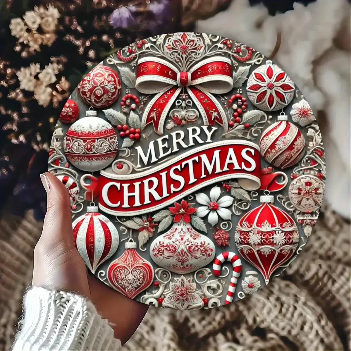 Close-up of Candy Wreath Metal Sign held in hand, highlighting detailed holiday ornaments and vintage finish for home decoration.