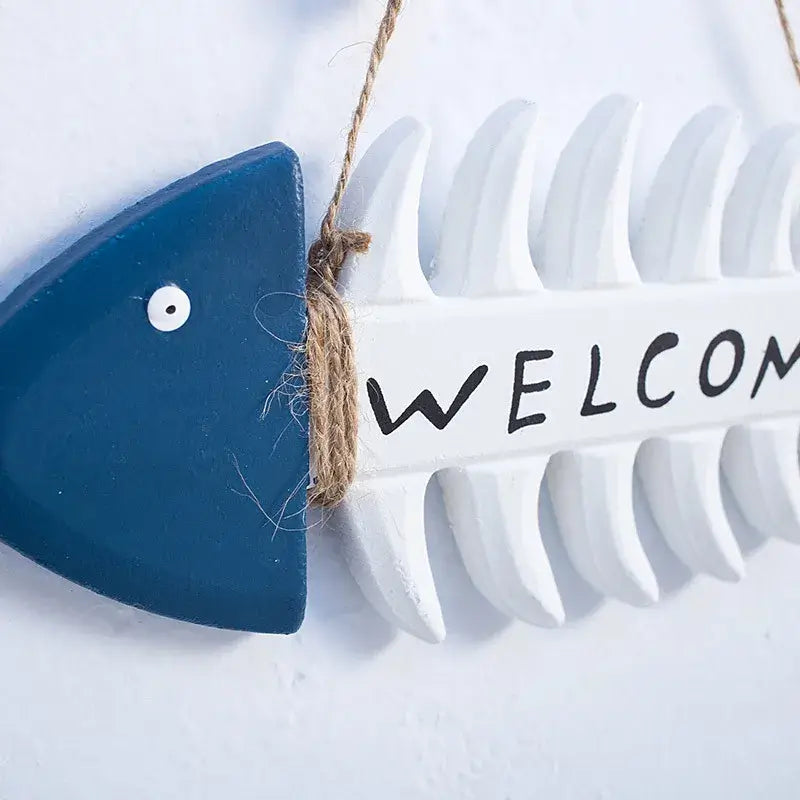 Detail view of the fish head and 'WELCOME' text on the Mediterranean Beach Themed Welcome Sign, perfect for garden or patio decor.