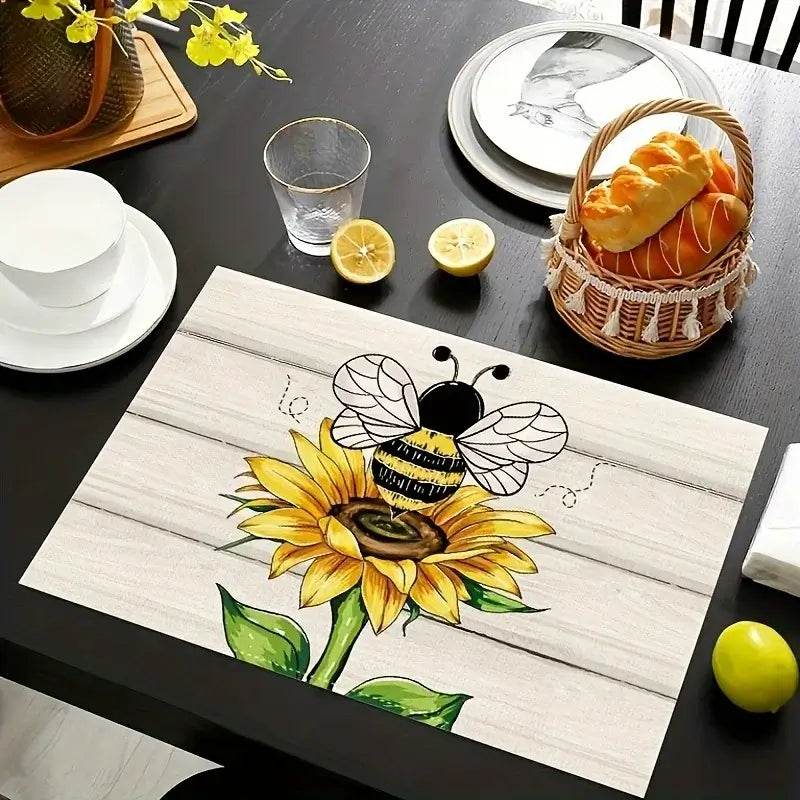 Bee and sunflower design placemat from 2pcs Linen Placemats Set, adding a cheerful and natural touch to seasonal table settings.