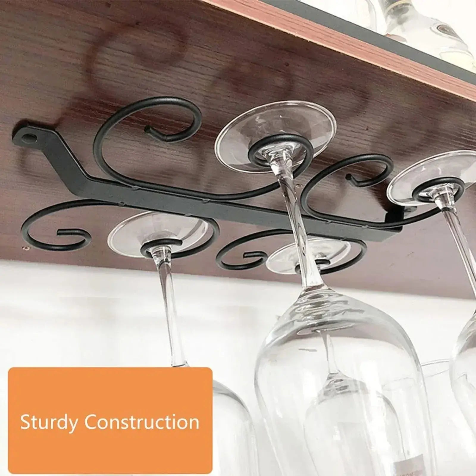 Sturdy under cabinet wine glass holder in black iron, securely holding glasses upside down for stylish kitchen or bar storage.