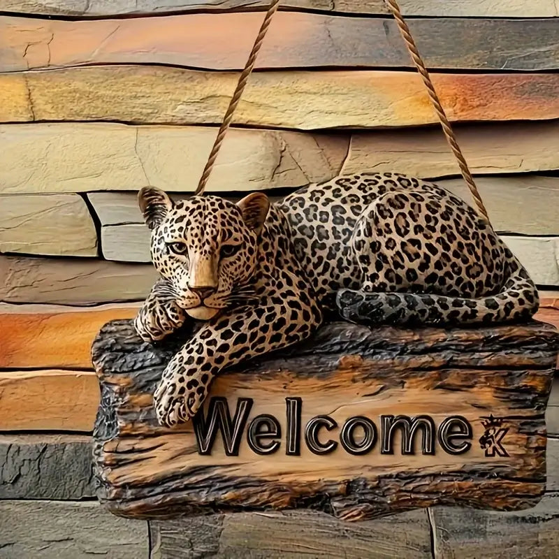 2D Planar Woodcut Wooden Welcome Sign featuring a lounging leopard on a faux wood plank. Precision-cut 9.80 inch sign for unique home décor.