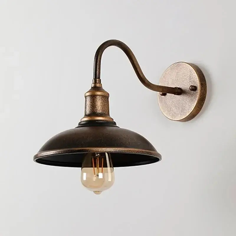 Close-up of Retro Outdoor LED Wall Lamp in bronze finish, highlighting its vintage waterproof design for garden or entryway use.