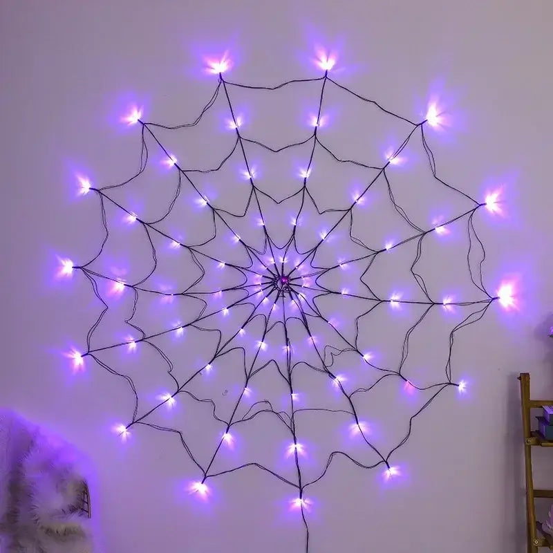 Purple Halloween Ghost LED Light String in spider web shape mounted on a white wall, ideal for indoor party decoration.