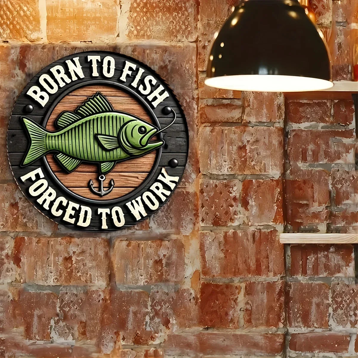 Fishing Enthusiast metal sign mounted on a brick wall under warm lighting, ideal for man caves or rustic home decor.