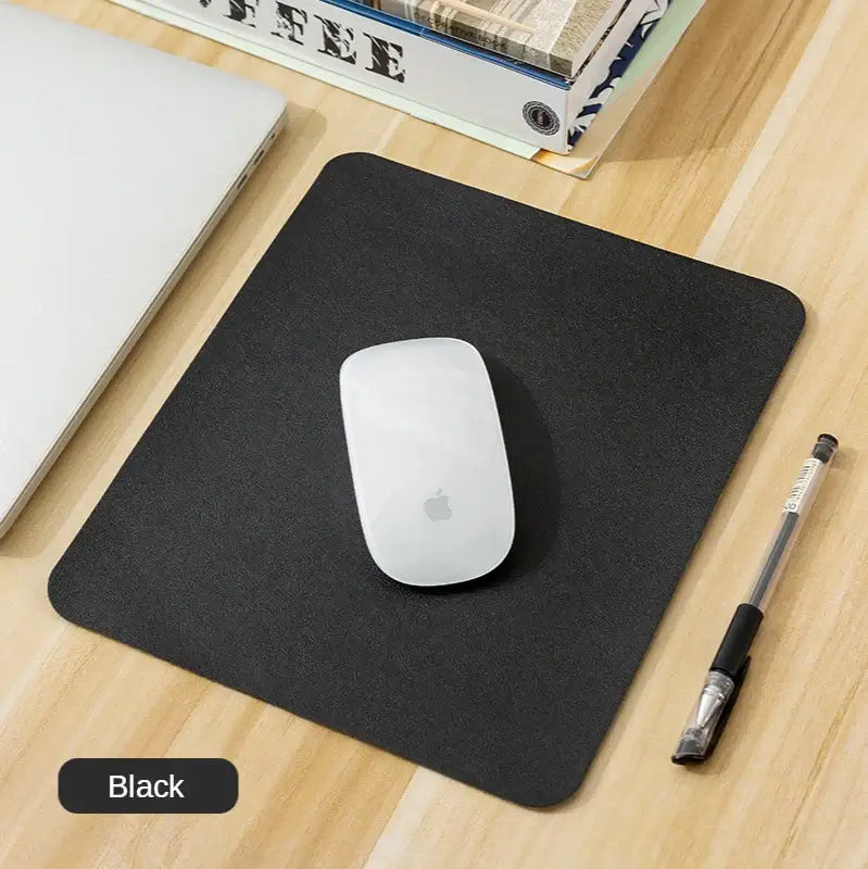 Black Small PU Leather Gaming Mouse Pad with non-slip backing, ideal for work or gaming on any desktop surface.
