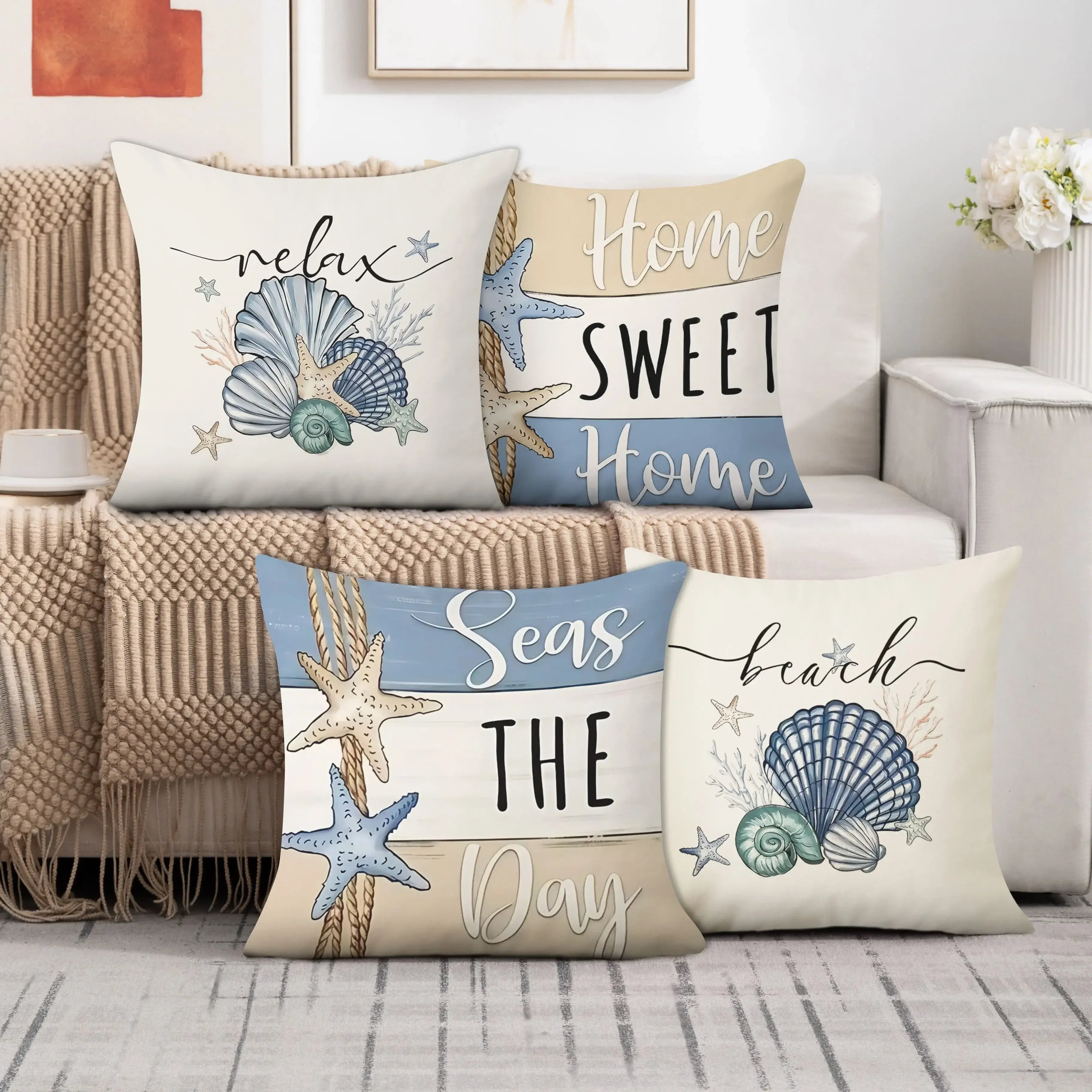 Ocean Home Decor Pillowcase set with nautical shell and starfish designs on a sofa. Soft fabric cushion covers for coastal-themed living rooms.