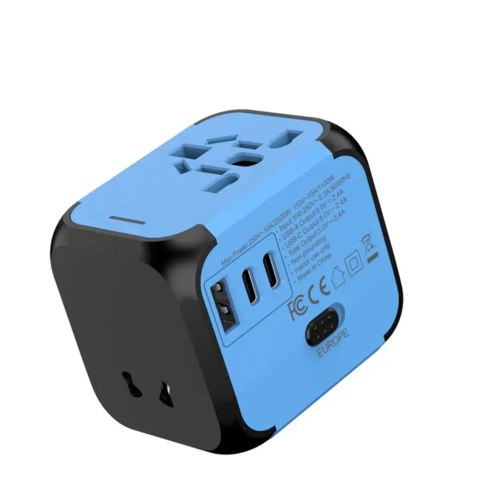 Blue Universal Travel Plug Adapter with dual USB-C and USB-A ports, CE and FCC certified, designed for international travel convenience.