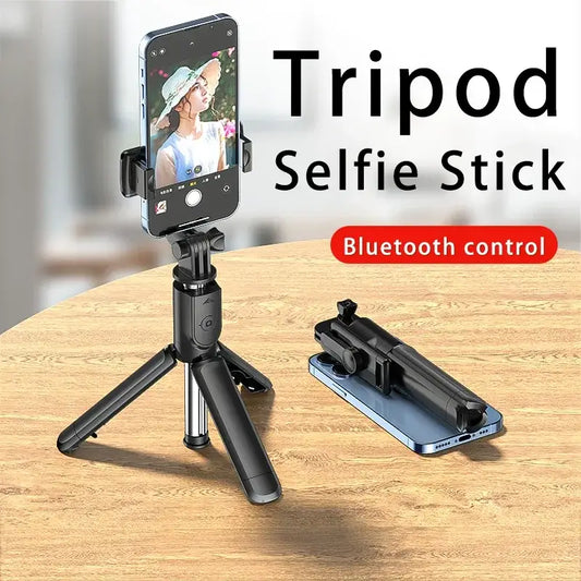 Bluetooth Selfie Stick Tripod with phone mounted, showing compact tripod base and Bluetooth control for hands-free photography.