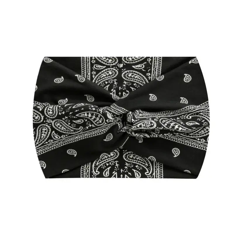 Black paisley 18CM stretch printed headband with white accents. Lightweight and perfect for sports or daily wear.