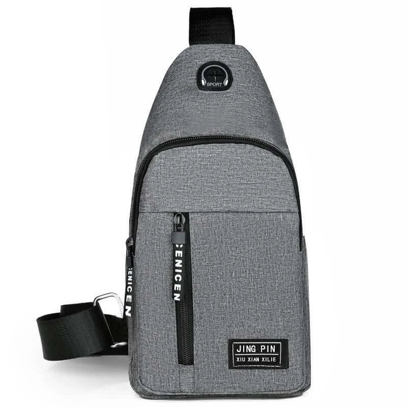 Gray crossbody shoulder bag with clean lines and compact structure, designed for practical use and modern aesthetics.