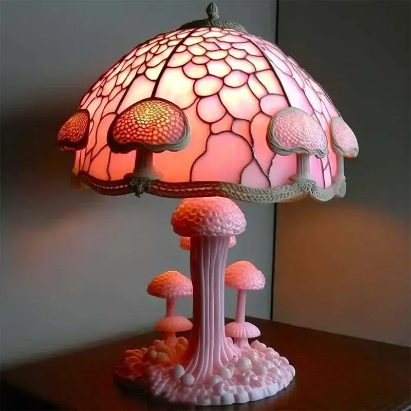 Pink mushroom-themed stained glass table lamp with resin base. Stained Plant Series design for whimsical home lighting.