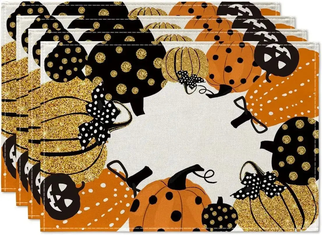 Halloween Table Placemats - Linen 4PCS with glittery pumpkins in orange and black. Festive and fun for Halloween parties.