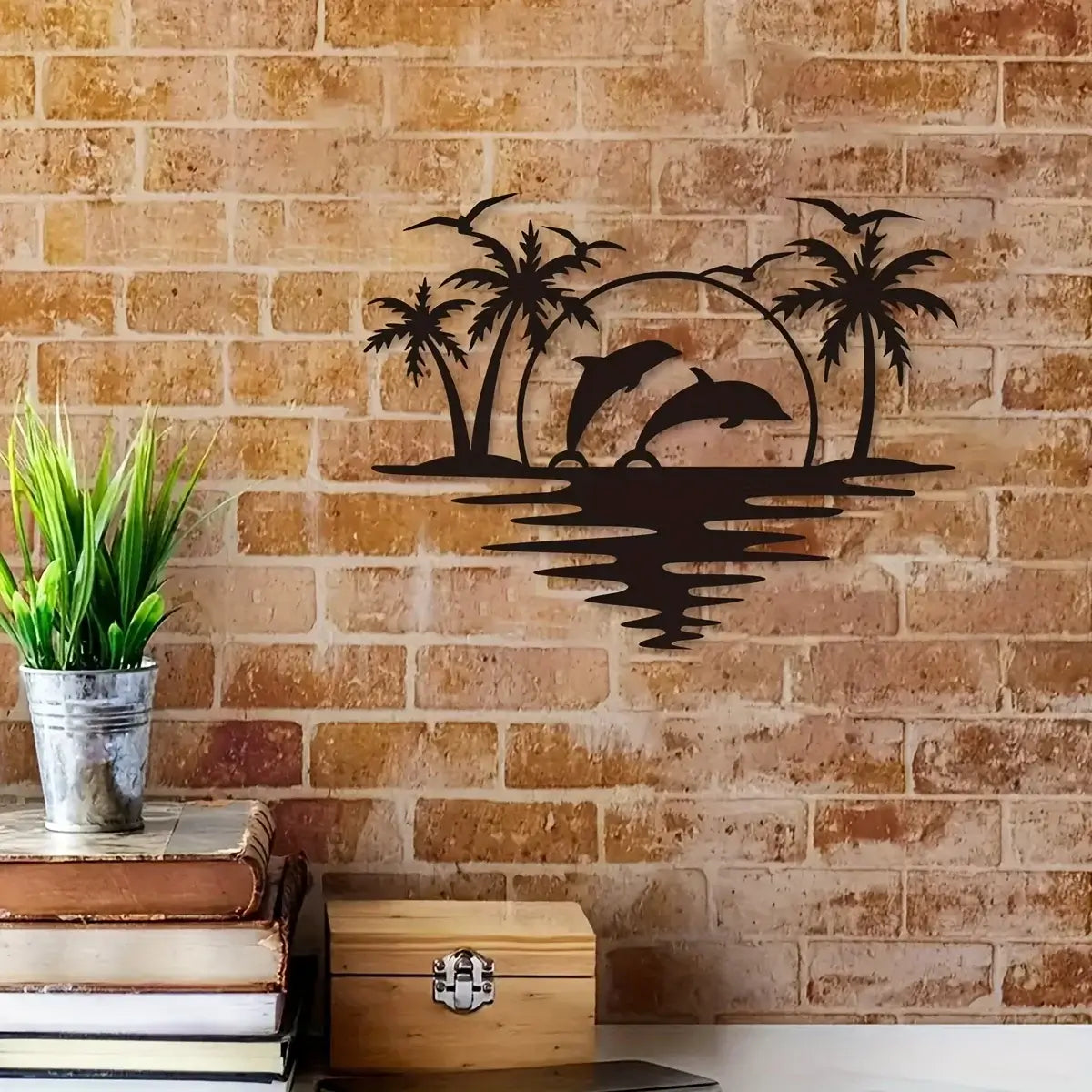 Iron dolphin and coconut tree wall hook decor on a brick wall, adding rustic coastal charm to indoor or outdoor living areas.
