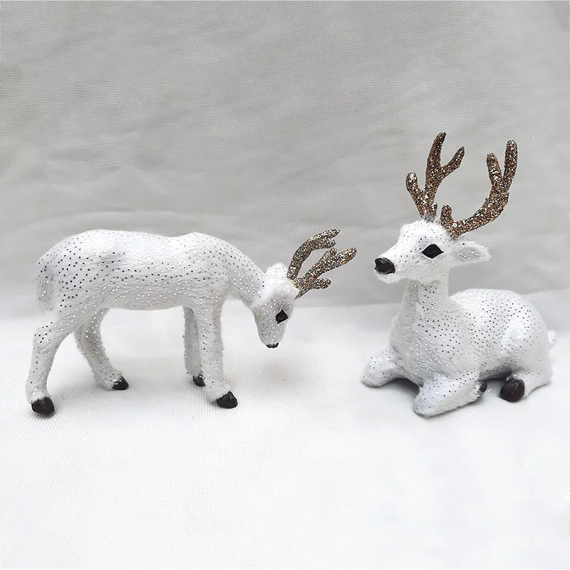White glittered Deer Reindeer Figurines - Table Miniatures with gold antlers, perfect for Christmas table or fireplace decoration.