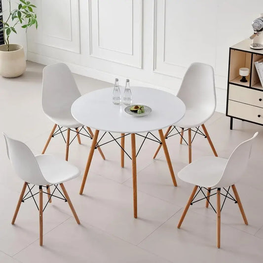5-piece round dining table set with white tabletop and four white chairs, space-saving design ideal for modern kitchens or dining rooms.