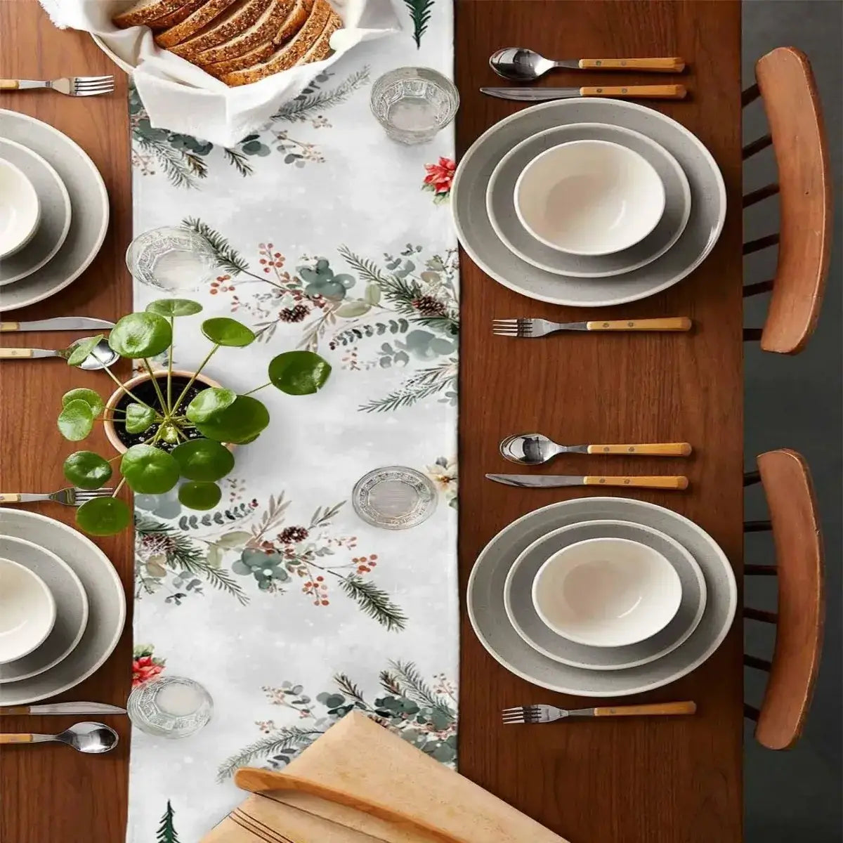 Elegant linen table runner with pine branches and berries pattern. Christmas design perfect for enhancing holiday table settings and decor.