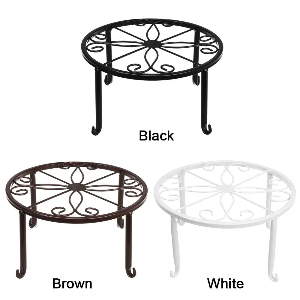 Three color options of metal potted plant stands—black, brown, and white—featuring durable scrollwork for home and garden use.