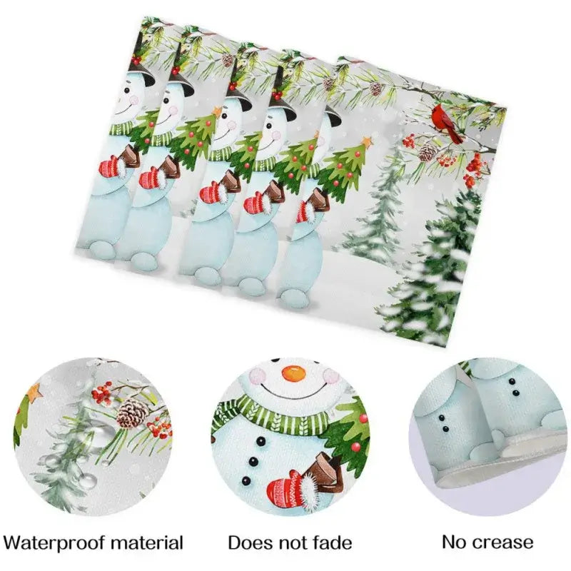 Set of 4 snowman linen placemats with festive forest design. Water-resistant, fade-proof, and wrinkle-free for Christmas dining.