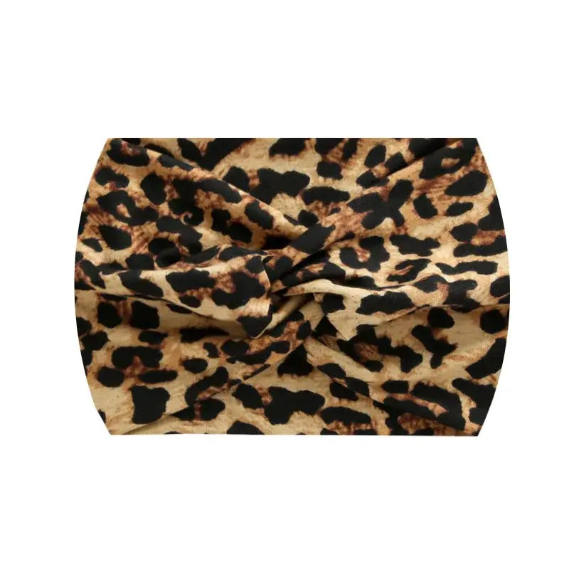 Brown leopard print 18CM stretch printed headband for women. Lightweight and ideal for athletic or casual styling.